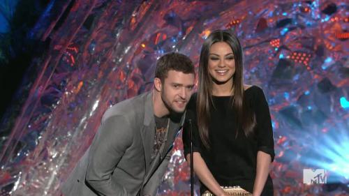 Mila Kunis  Justin Timberlake grab each other